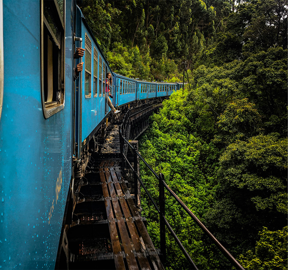 scenic-picture-of-a-train-on-a-bridge-through-forest-Sri-Lanka
