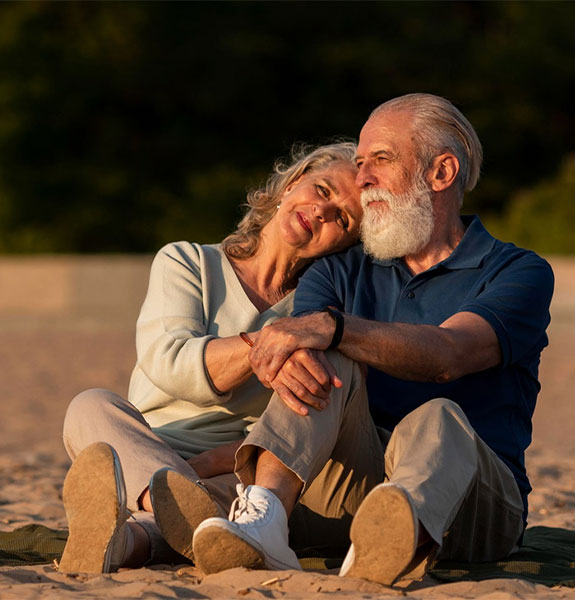 senior-couple-relax-on-beach-sri-lanka