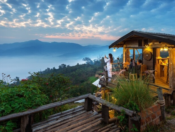 a-lady-enjoy-the-view-on-a-villa-from-hill-Sri-Lanka